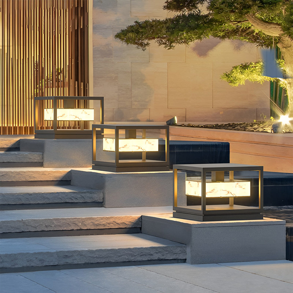 Solar pillar lights placed along garden steps at night