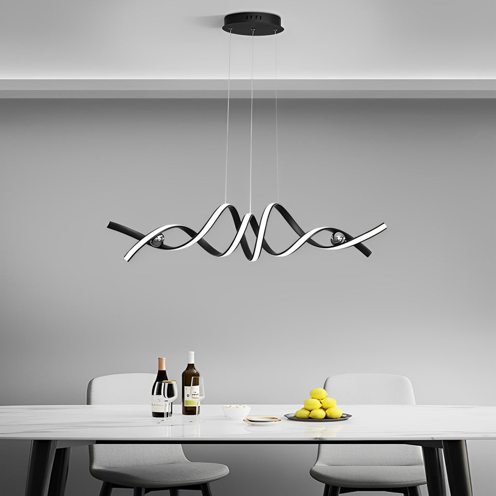 Black and white spiral ceiling light above a minimalist dining table.
