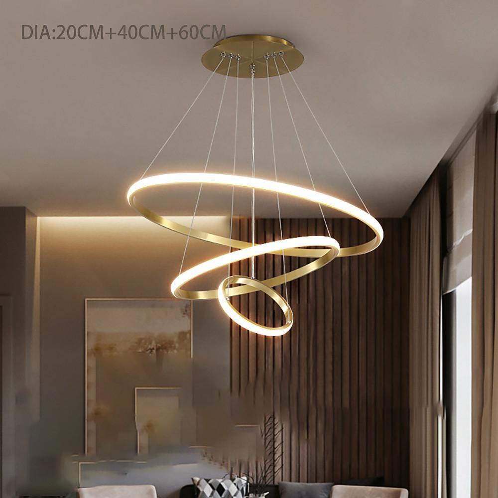 Spiral ring LED chandelier with warm lighting in modern space.