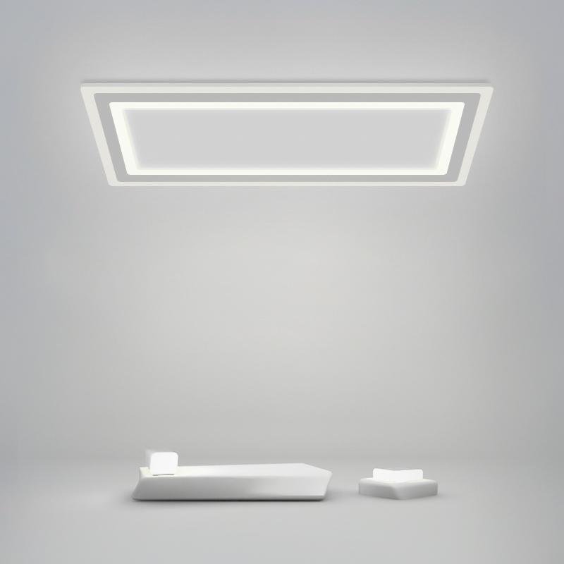 Square flush mount light with a layered design, providing warm illumination.