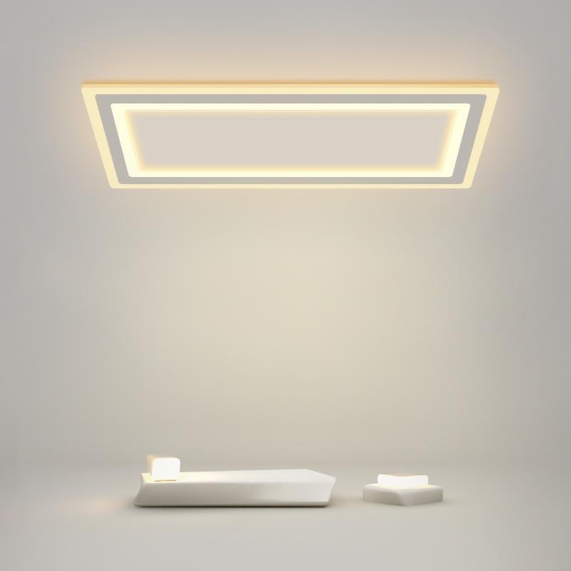 Square flush mount light with a modern design, illuminating a stylish room.