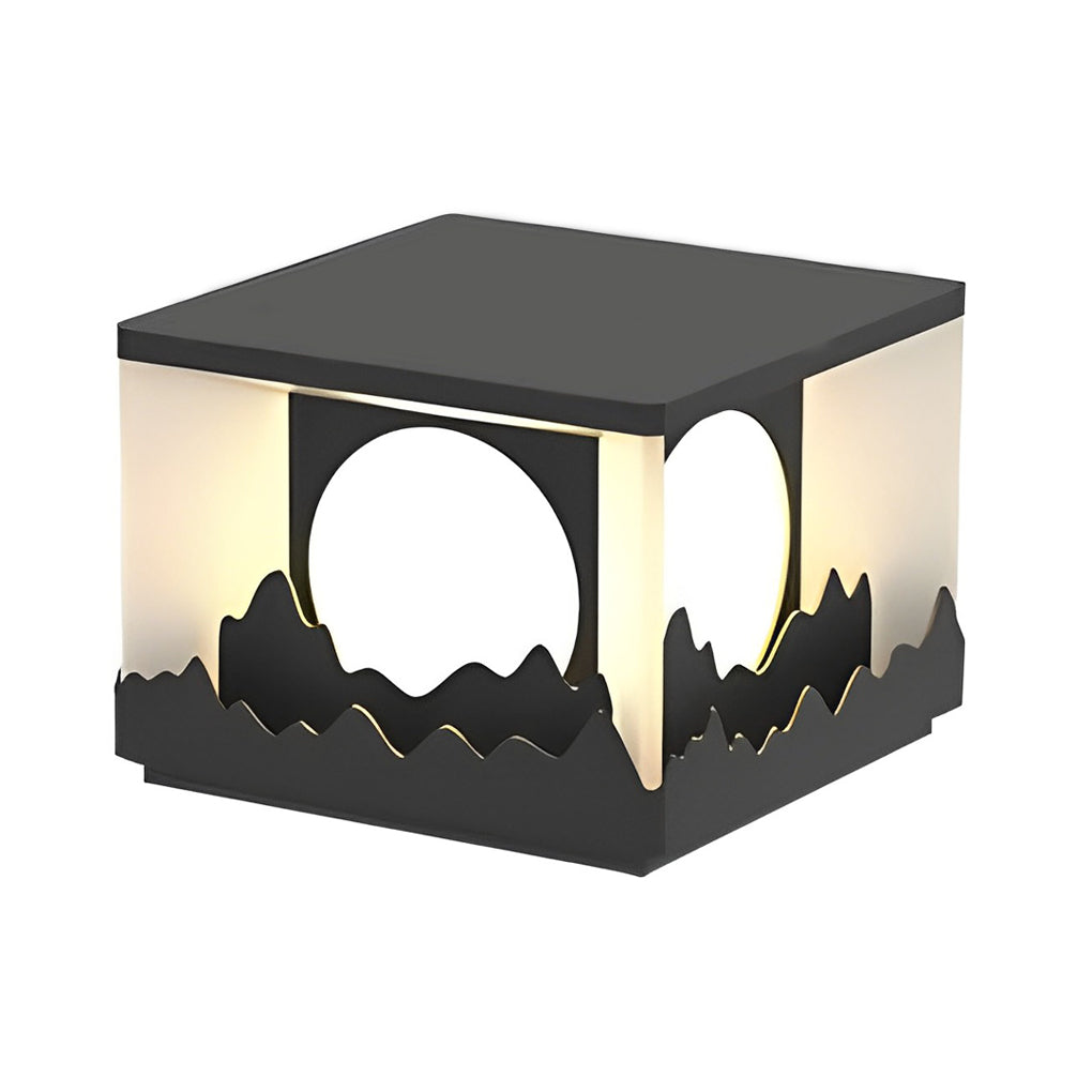 Square outdoor pillar lights with a close-up of the illuminated mountain pattern.