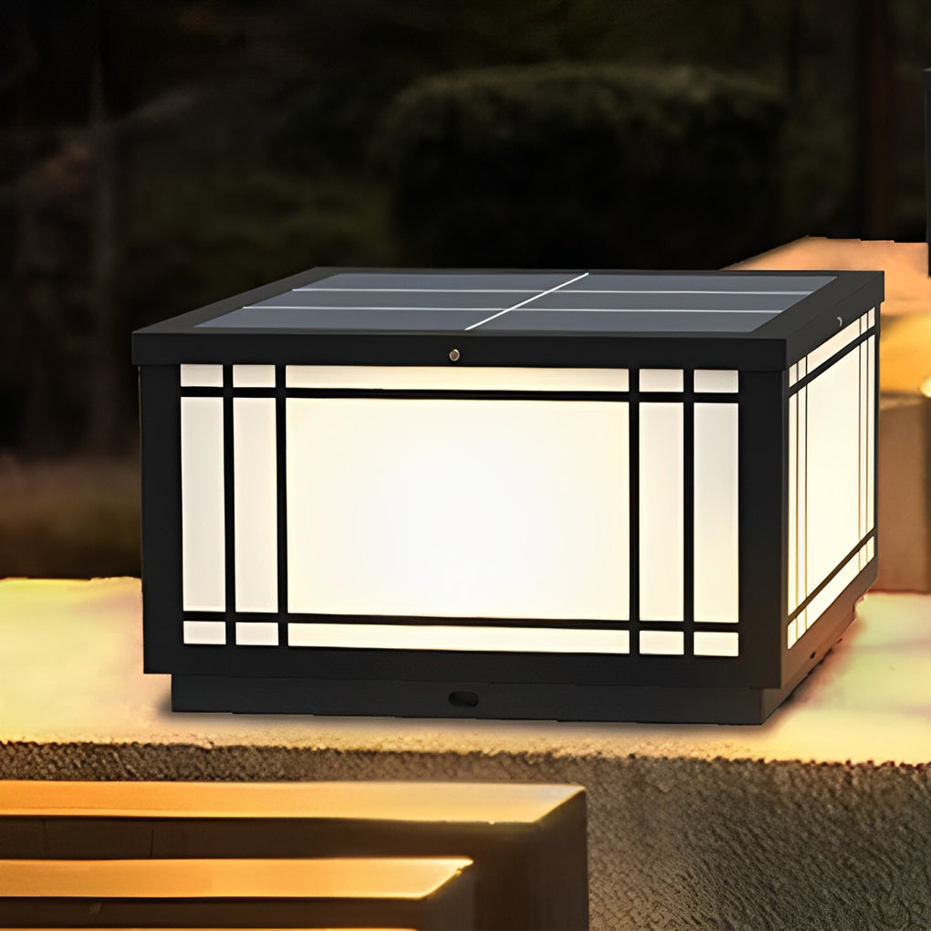 Square pillar light close-up showing frosted glass panels and black metal frame designed for outdoor durability.