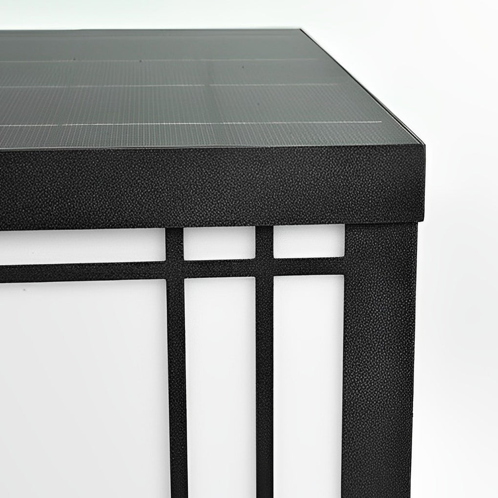 Square pillar light detail view highlighting textured glass and clean metal edges for a minimalist outdoor look.