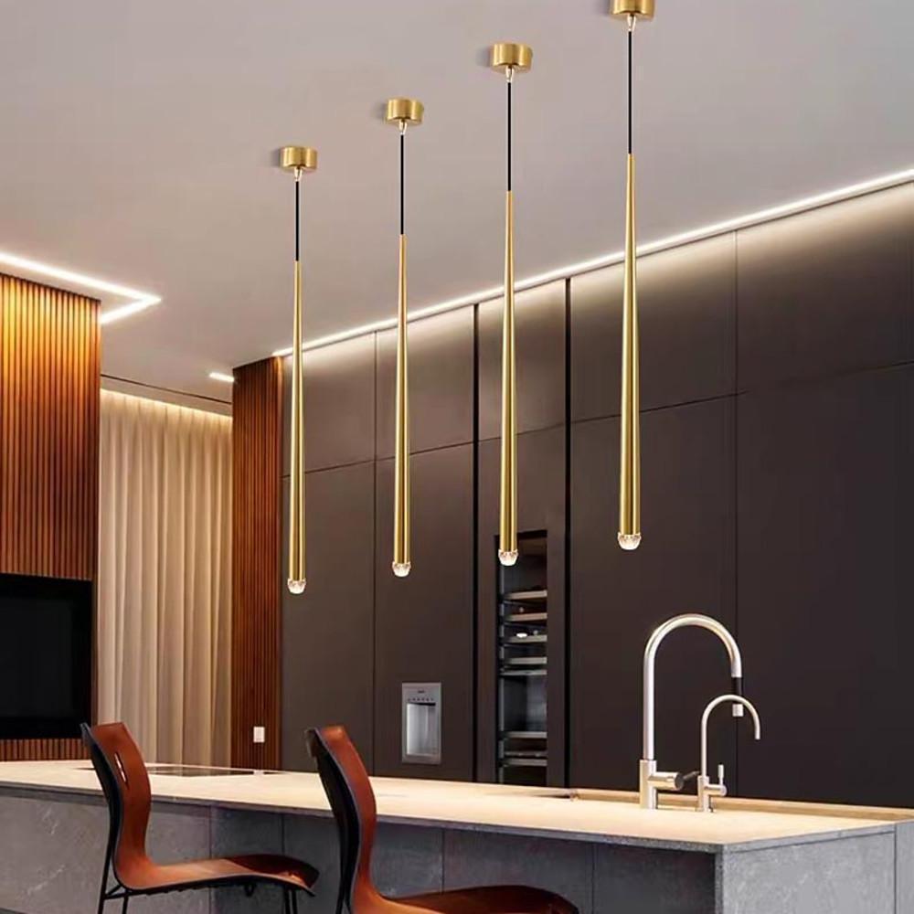 Cluster of five Slim Gold Cone Pendant lights at staggered heights over a modern dark kitchen bar.