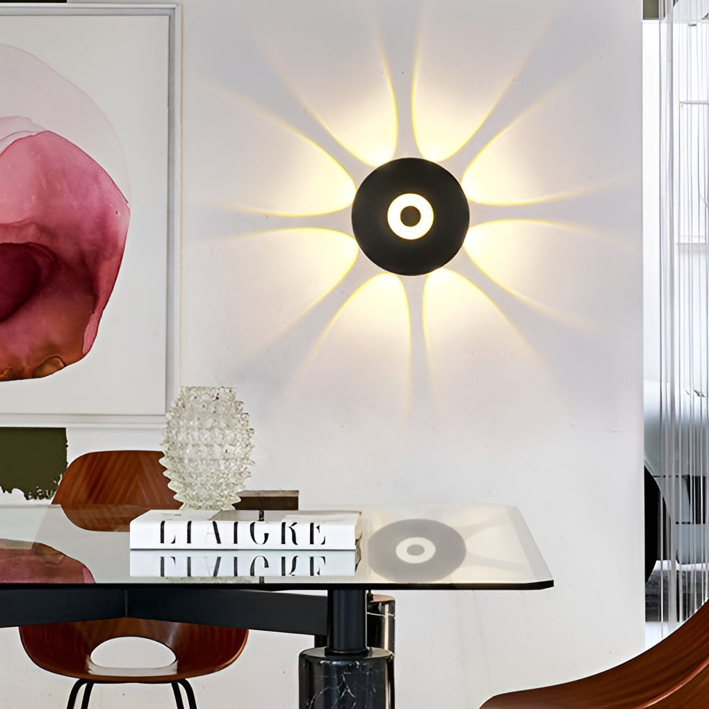 Sunflower LED wall light illuminating a contemporary indoor space with stylish design.