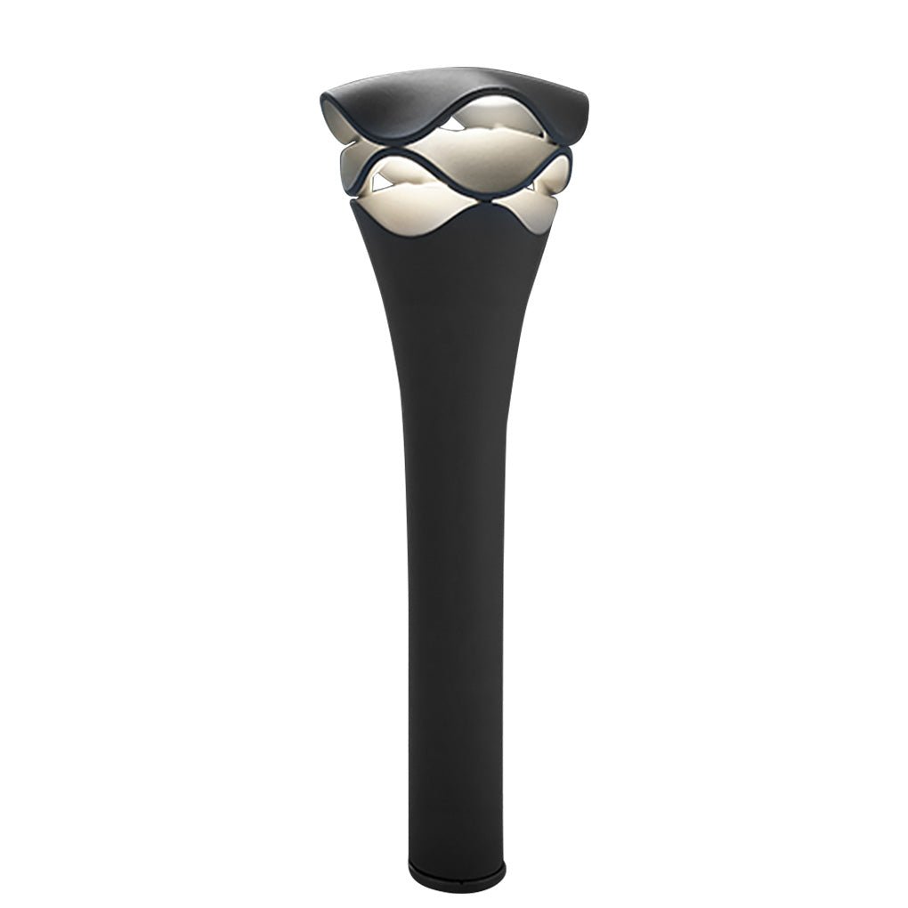 Tall black wave design path light with warm LED glowing on a white studio background for garden.