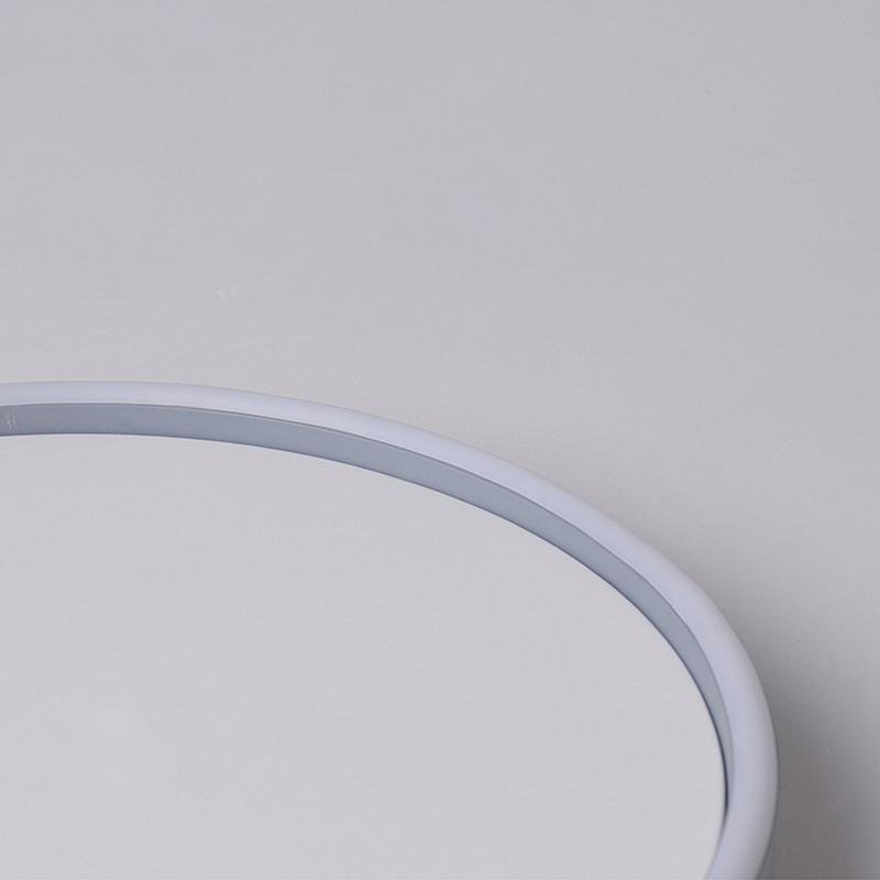 Ultra thin LED ceiling light close-up showing indirect halo lighting effect.
