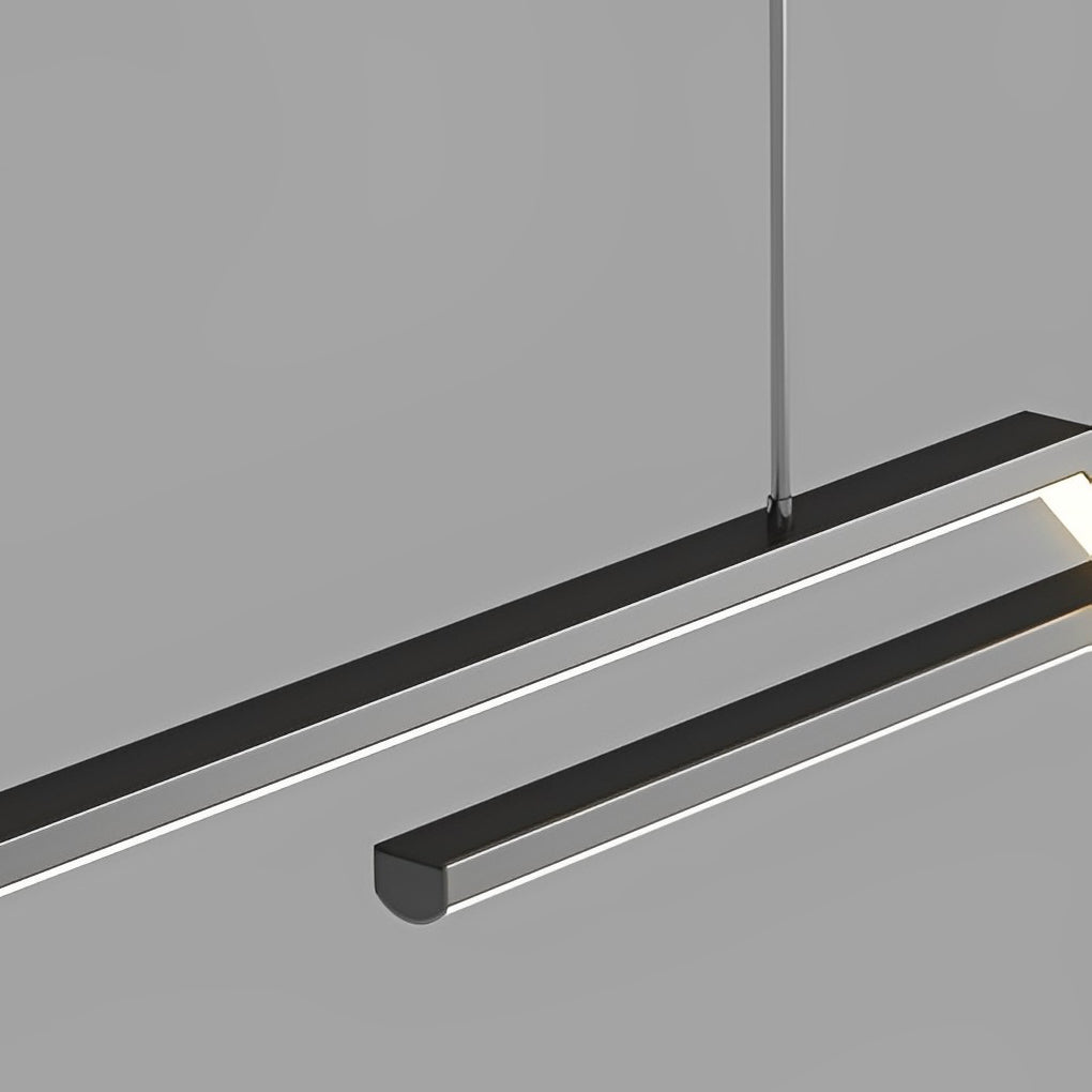 Unique pendant lighting close-up showing the slim linear LED bars and suspended cable design in a modern finish.