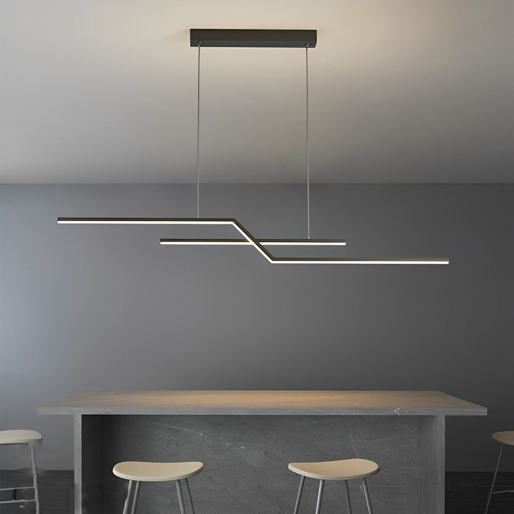 Unique pendant lighting suspended above a dining table, showcasing a sculptural linear design in a neutral modern interior.