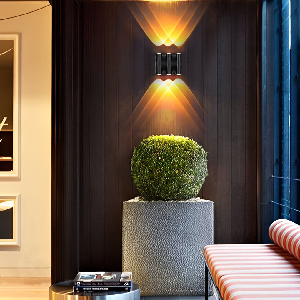 Up and down light wall sconce providing elegant illumination for a contemporary patio.