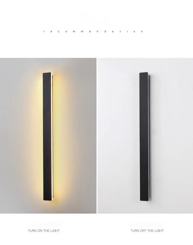 Long outdoor wall lights with vertical LED light, installed on white wall for clean and modern illumination.