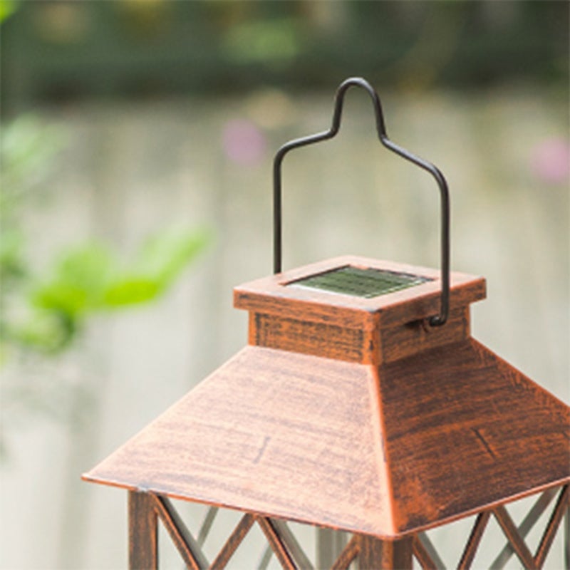 Vintage garden lanterns with a close-up of the lantern's detailed design.