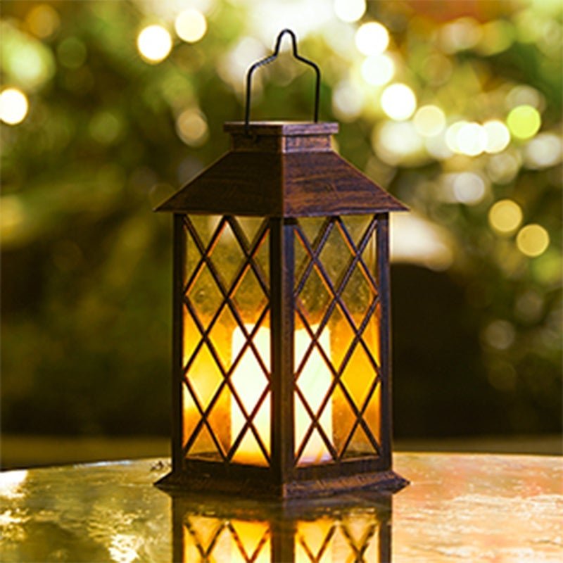 Vintage garden lanterns displayed on a garden table with a soft light effect.