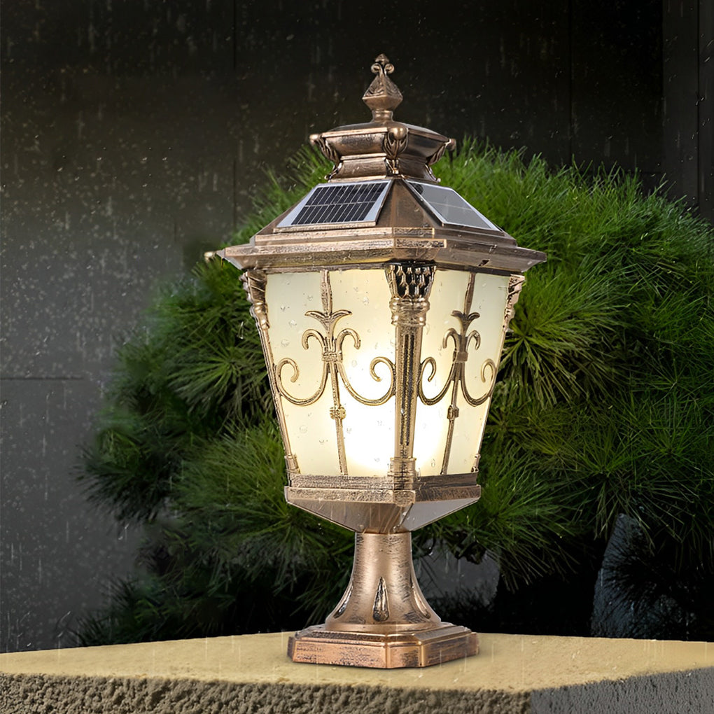 Vintage-style cast aluminum post light with bronze finish, providing warm illumination for a backyard setting.