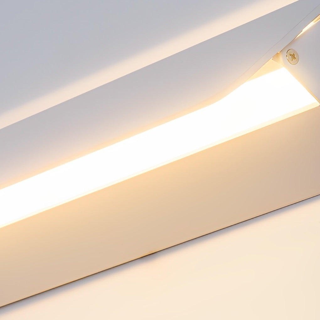 Close-up of wall adjustable light LED strip emitting warm light.