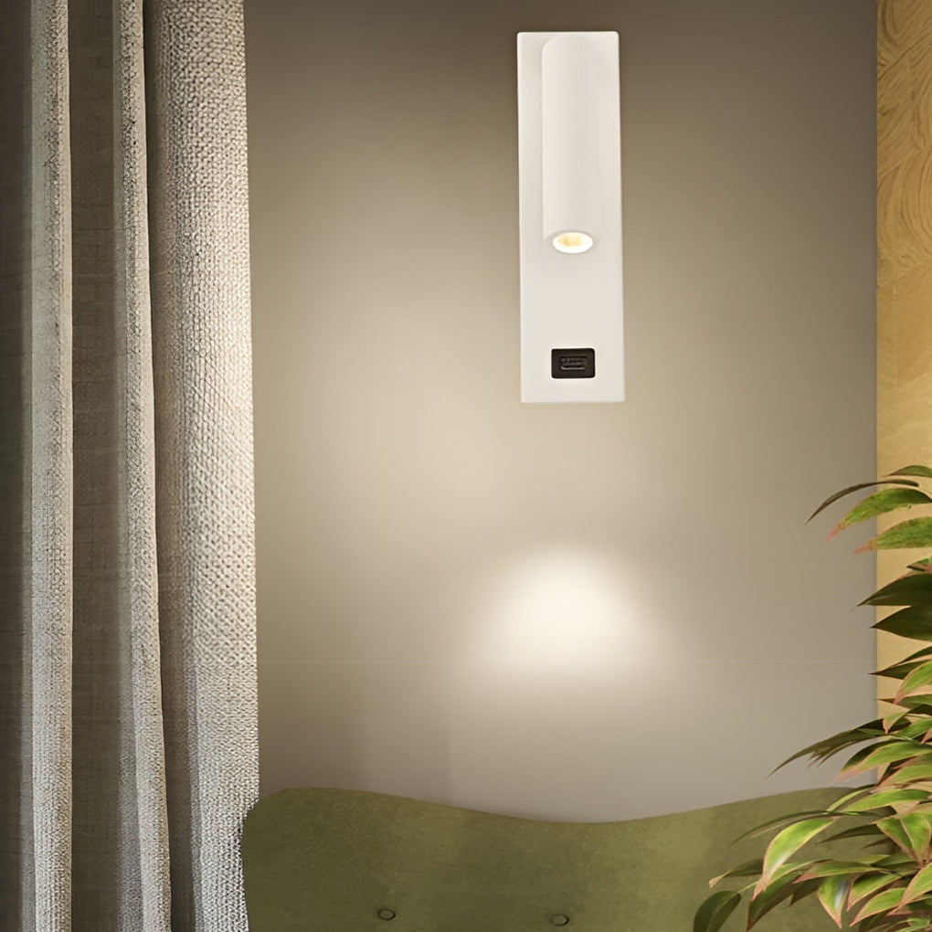 Wall lamp with USB charger providing elegant illumination for a contemporary study.