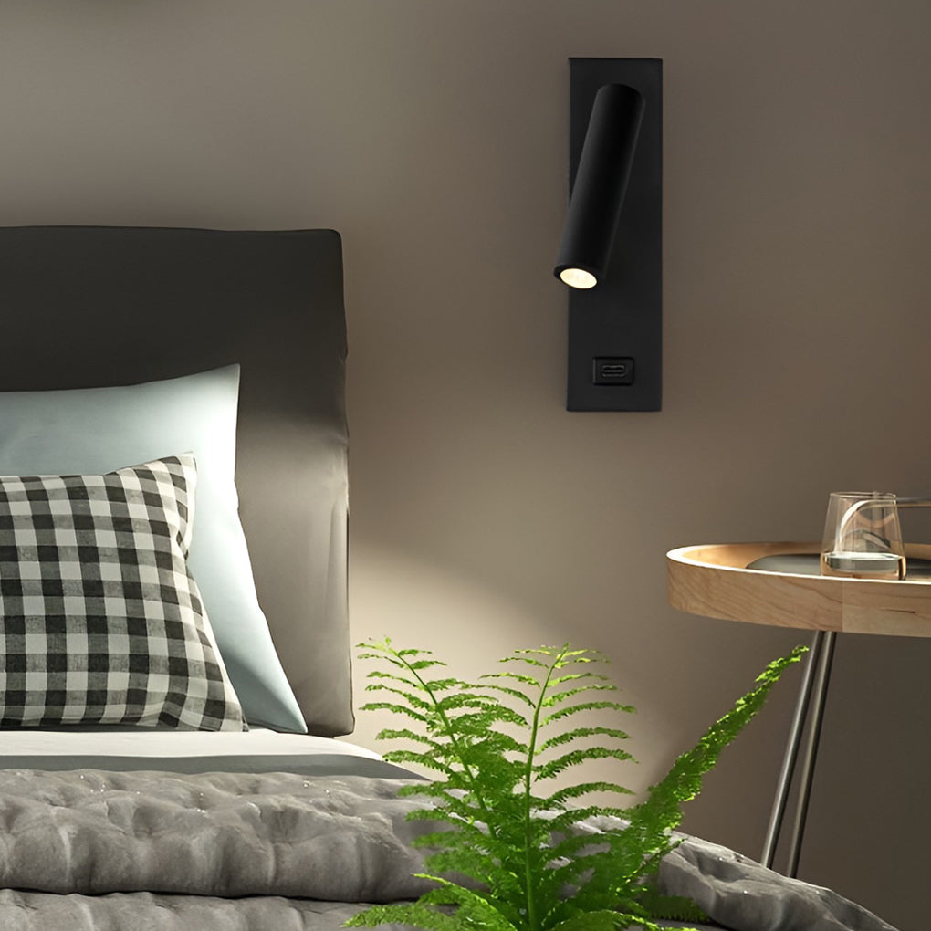 Wall lamp with USB charger illuminating a minimalist interior with focused glow.