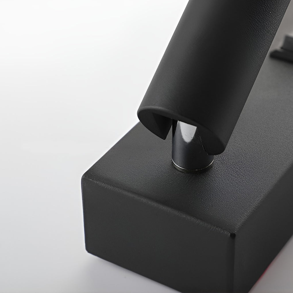 Wall lamp with USB charger with detailed view of its USB port and structure.