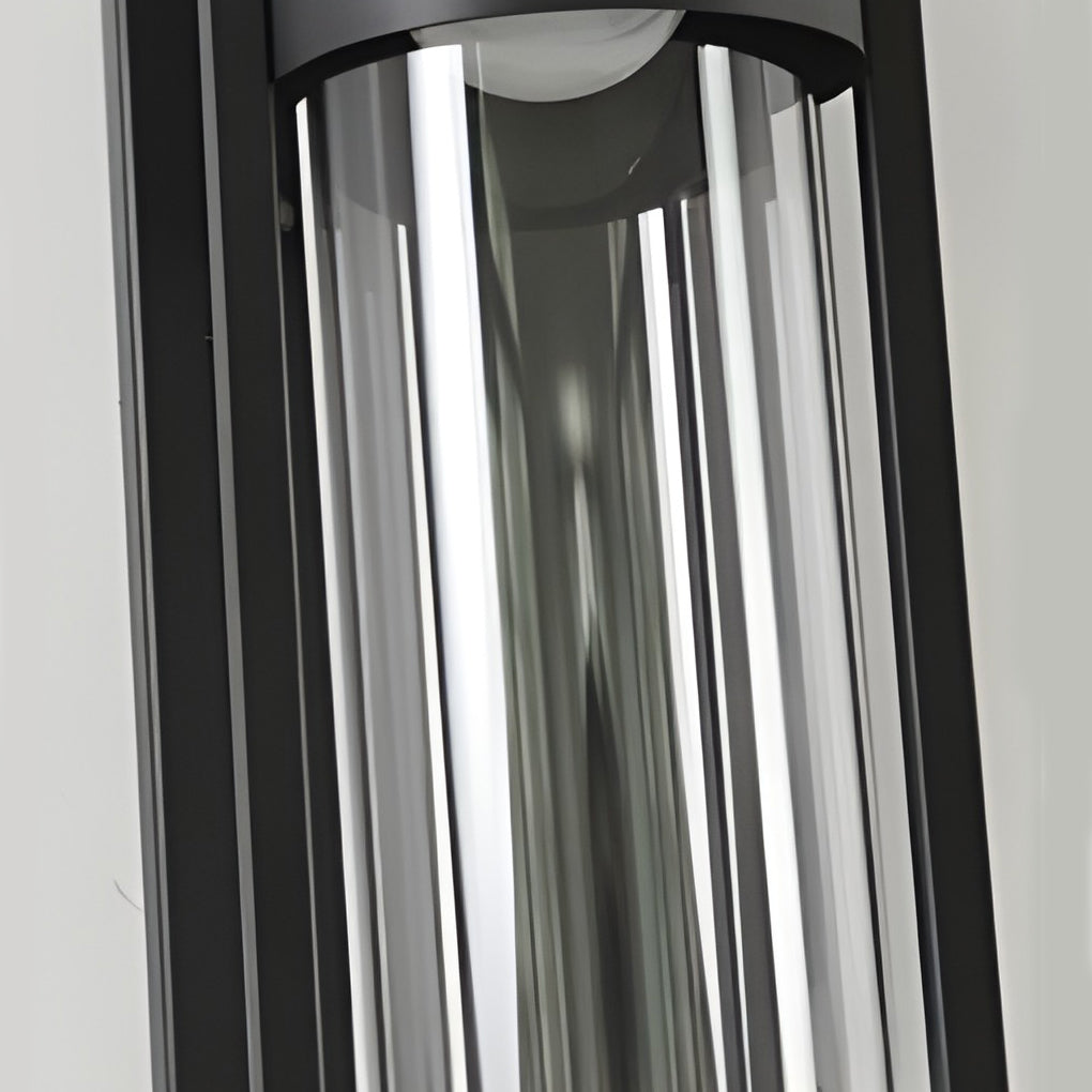 Close-up detail of wall mount outdoor lighting with clear glass tube