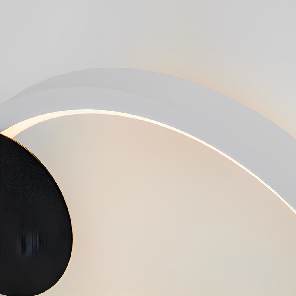 Wall mounted nightstand lights in horizontal orientation with black textured elements, used as accent lighting above storage.