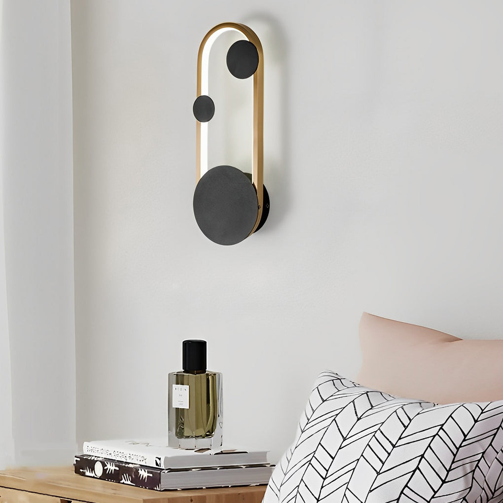 Wall mounted nightstand lights in a slim vertical profile, providing focused bedside lighting in a modern sleeping area.