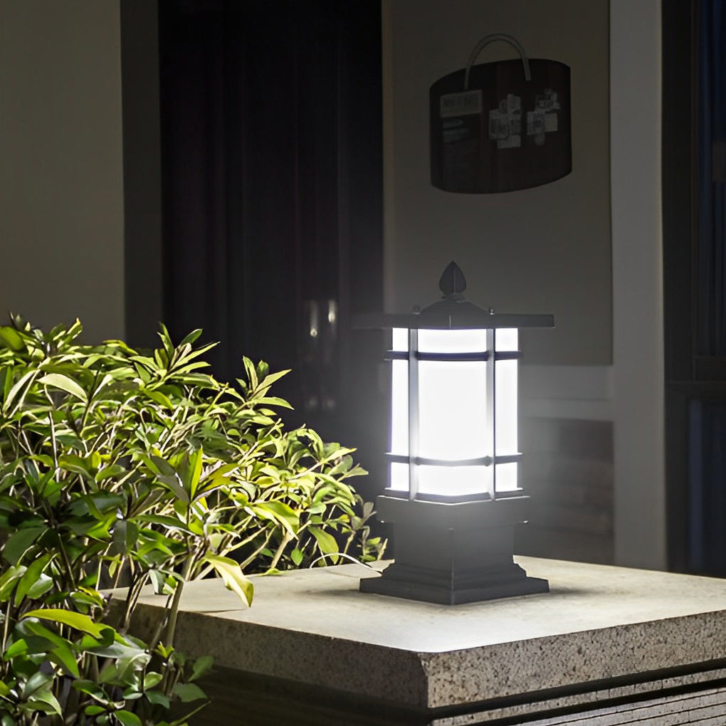 Wall pillar lights outdoor casting a gentle glow near a stone pathway.