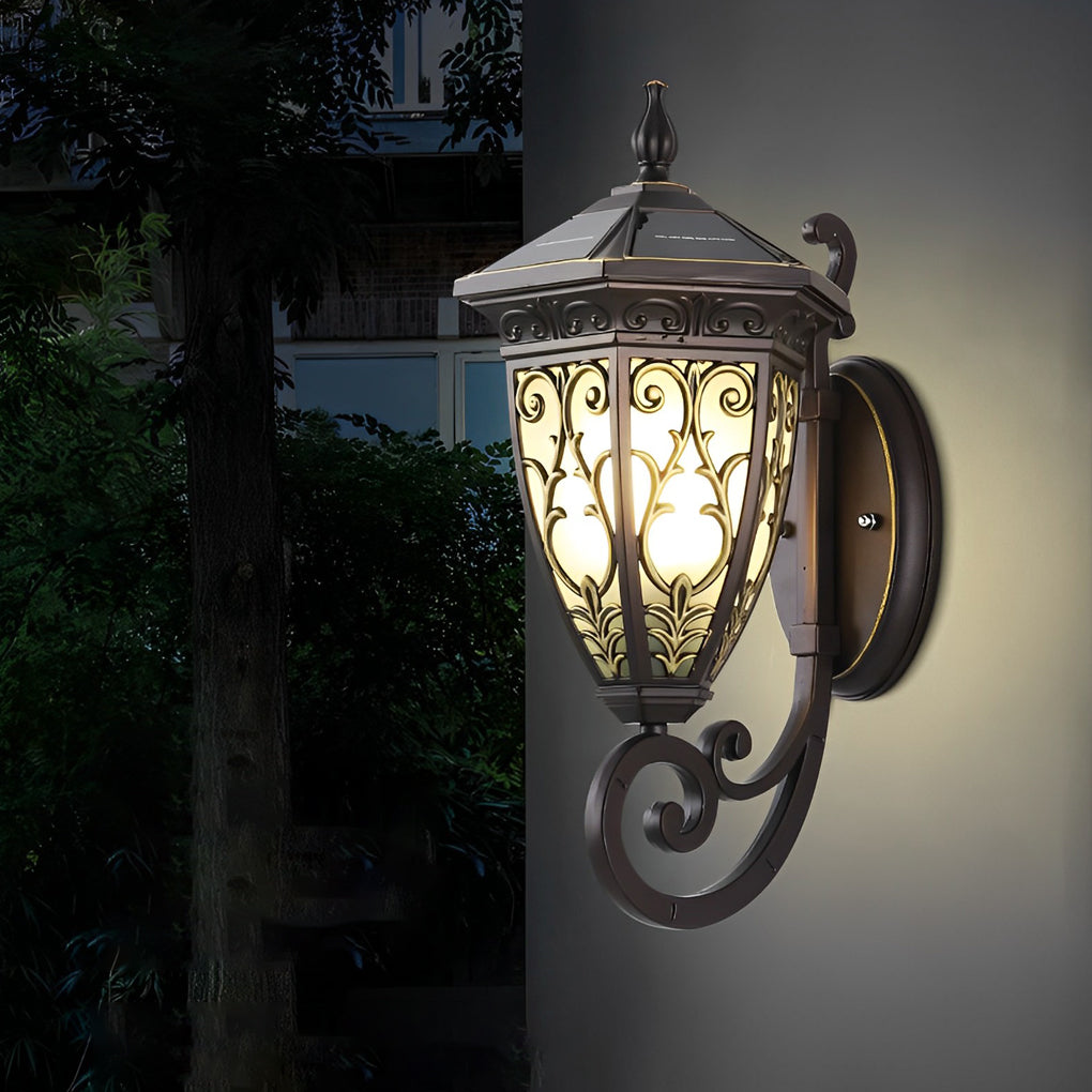 Wall sconce lantern with a close-up of its glass panels and elegant metalwork.