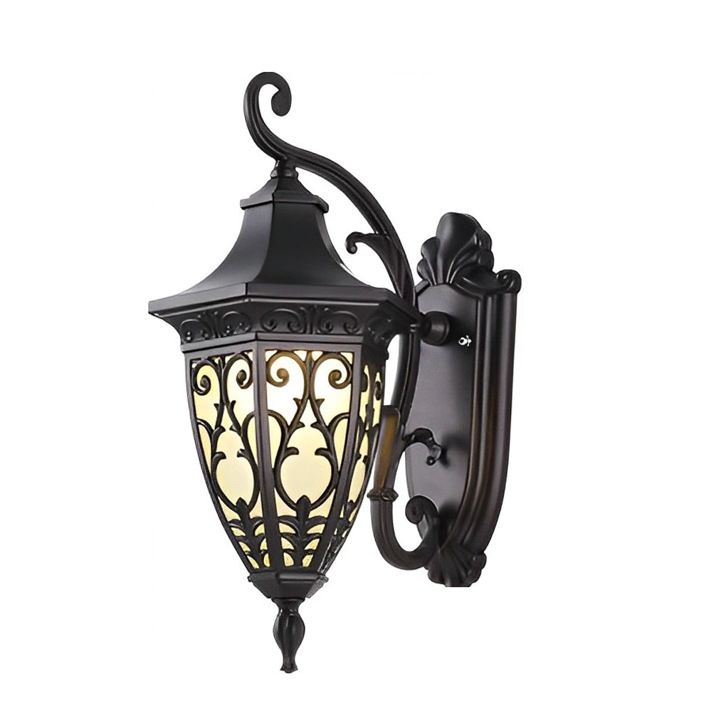Wall sconce lantern with a traditional design, providing warm light in an outdoor setting.