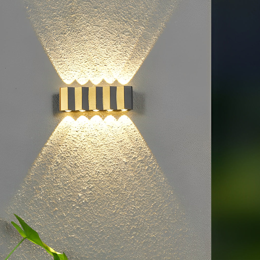 Wall sconce up-down light illuminating a balcony with soft, ambient light.