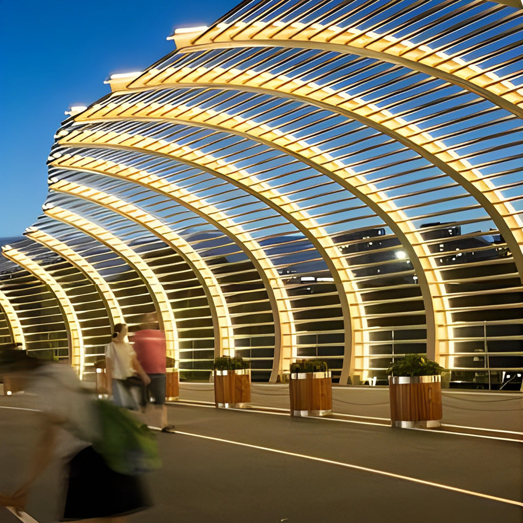 Waterproof LED light strips used in a curved architectural tunnel, delivering dramatic linear lighting for public spaces.