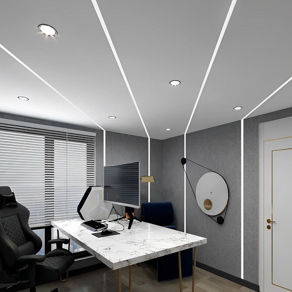 Waterproof LED strip lights forming linear patterns on office ceilings