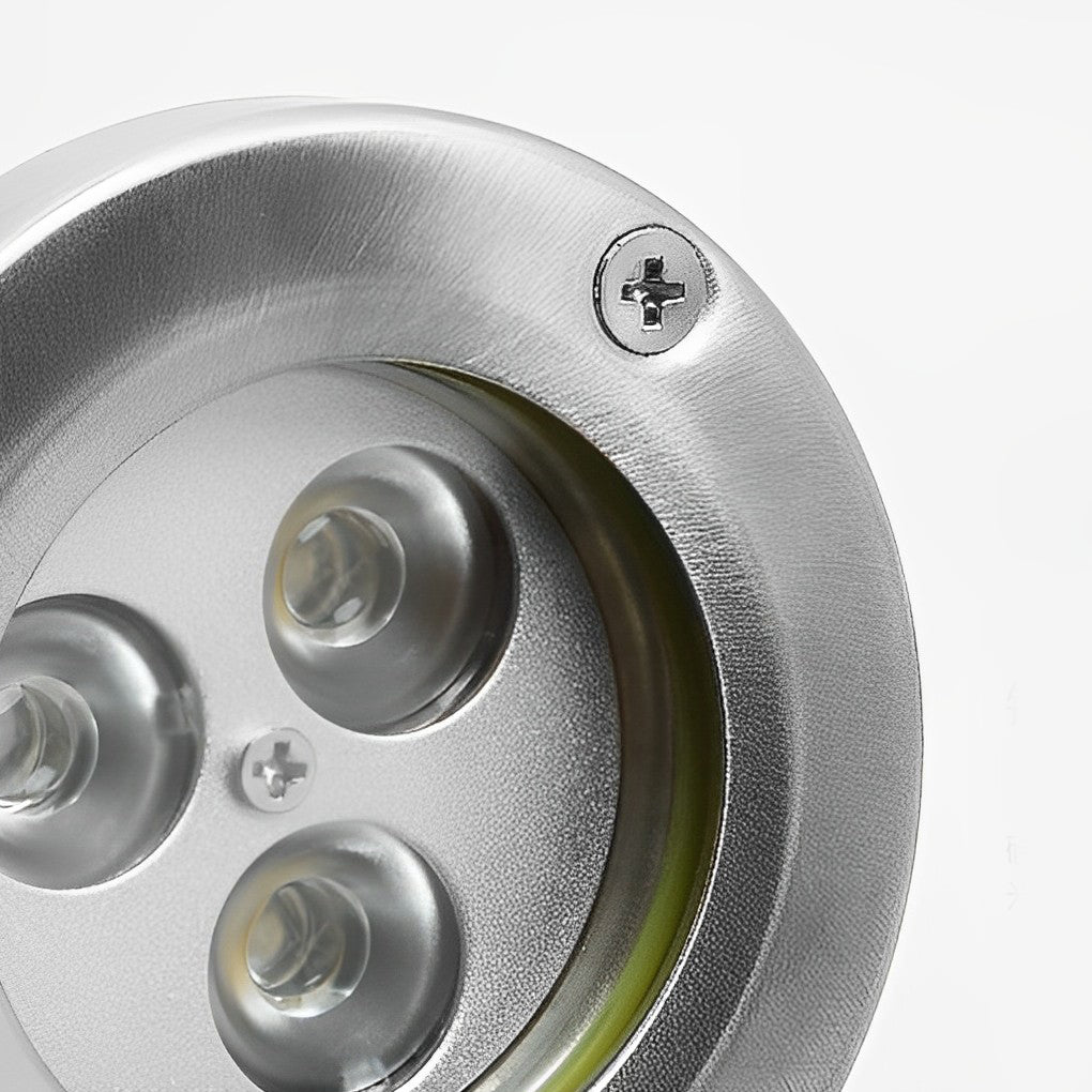 Waterproof outdoor spotlights with adjustable heads, displayed against a white background for clarity.