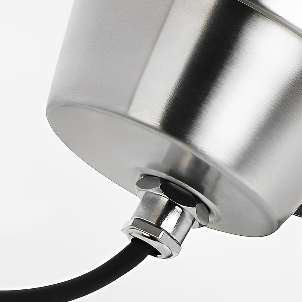 Close-up of waterproof outdoor spotlights, showcasing the stainless steel housing and LED light points.