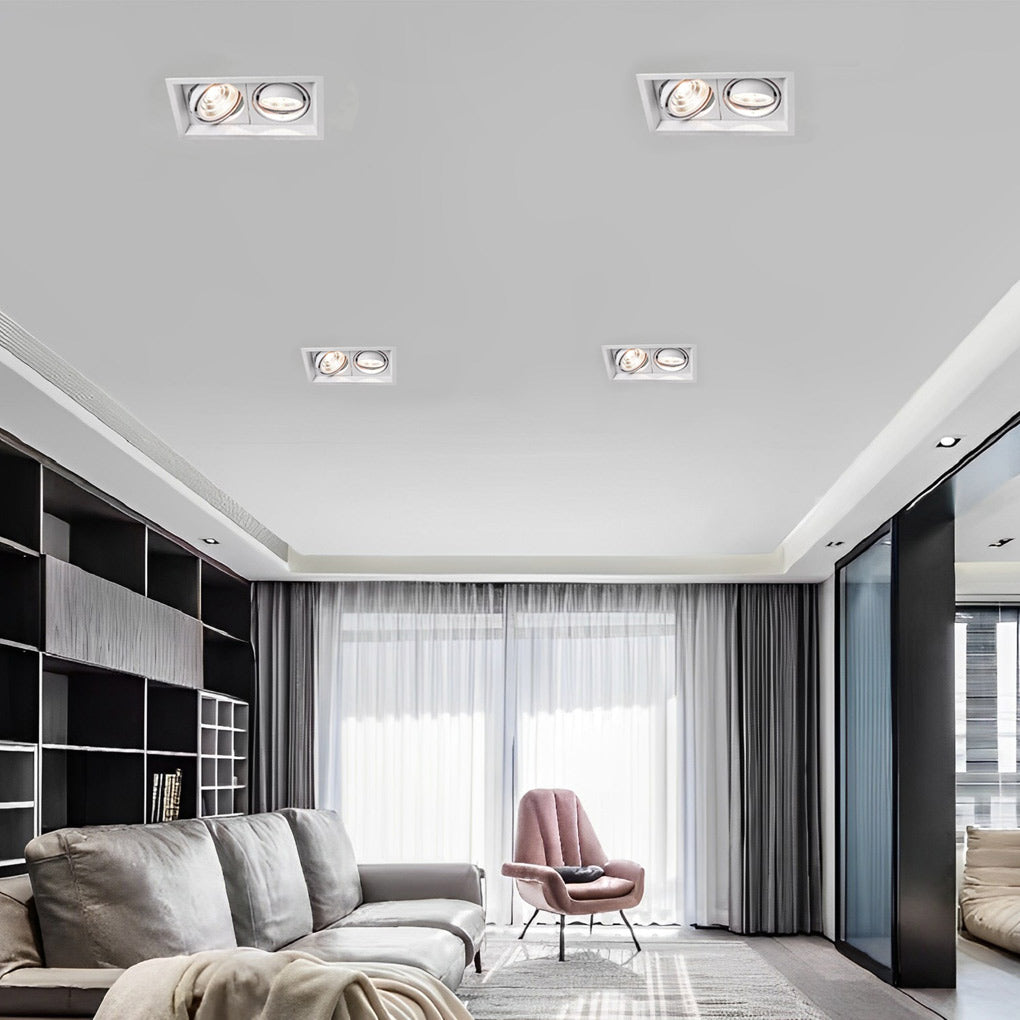 White ceiling with evenly spaced twin recessed lights creating balanced illumination.