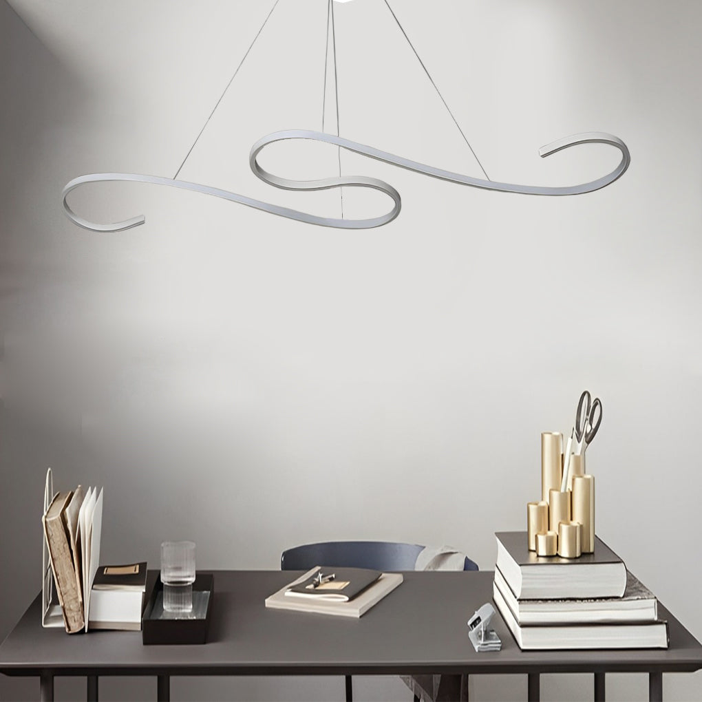 White chandeliers with a sophisticated curved design, hanging in a minimalist living room.