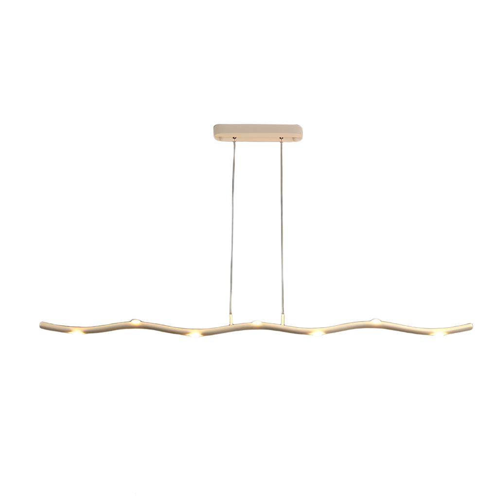 White wave pendant light with a minimalist design, installed in a modern kitchen.