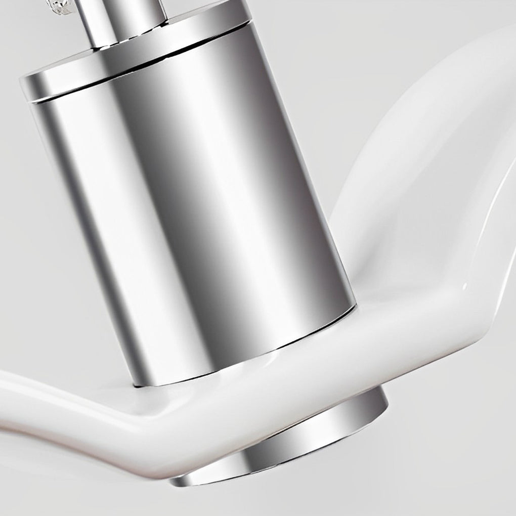 Close-up of metal canopy and suspension detail of wing pendant light.