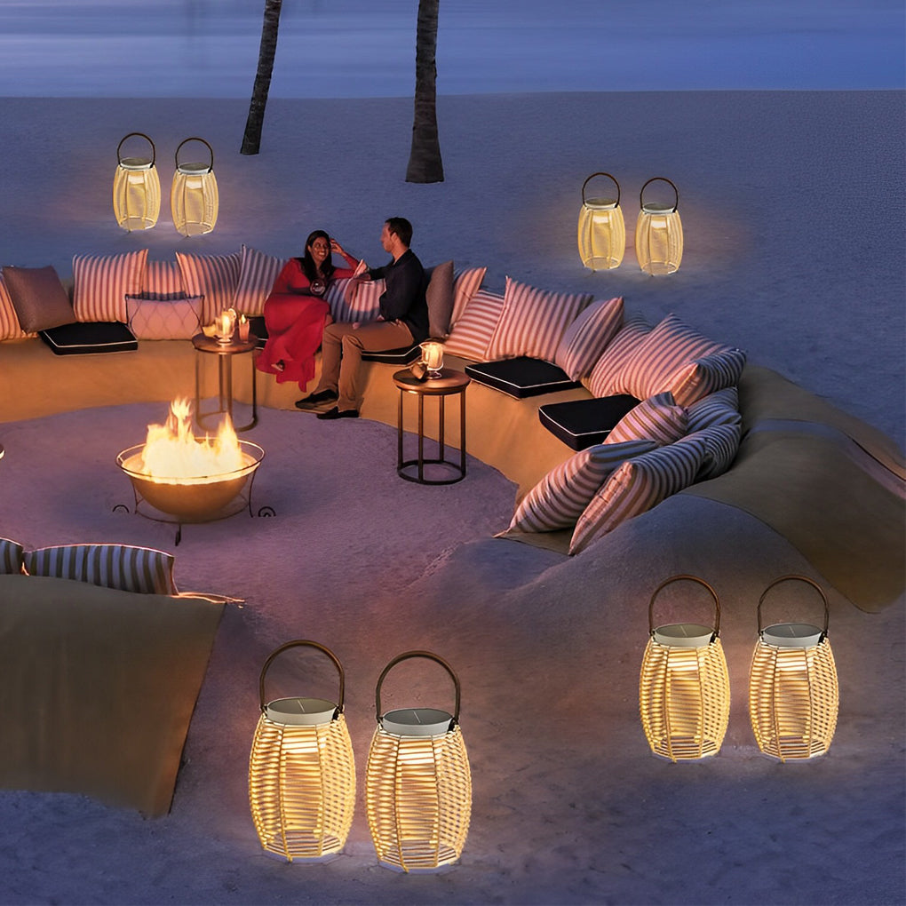 Woven rattan lanterns providing soft illumination in a backyard patio setting.